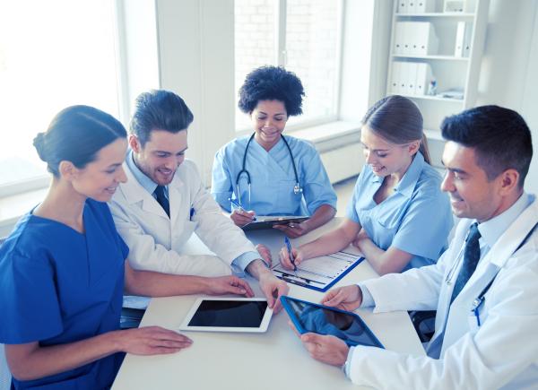 Medical team around a table